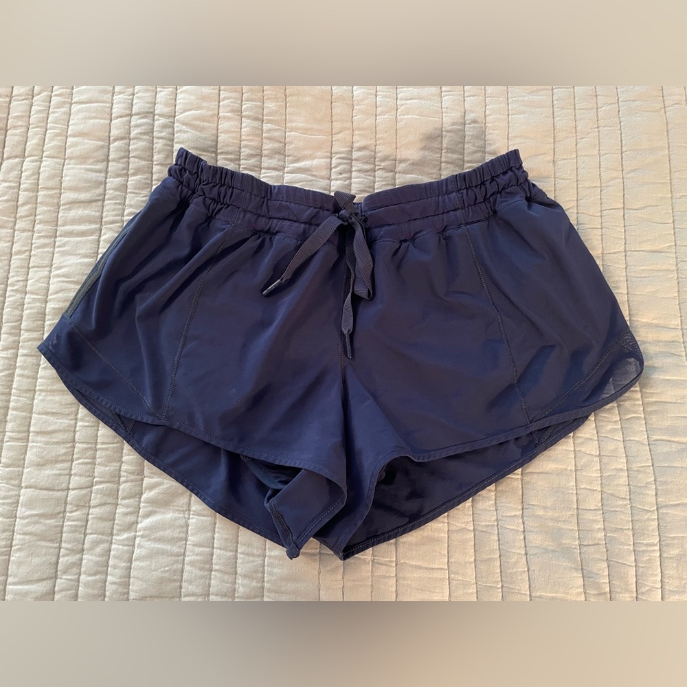 Lululemon women’s navy blue running shirts. Size 12. Good condition.